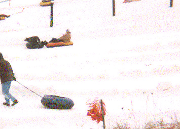 Joyce and kids tubing